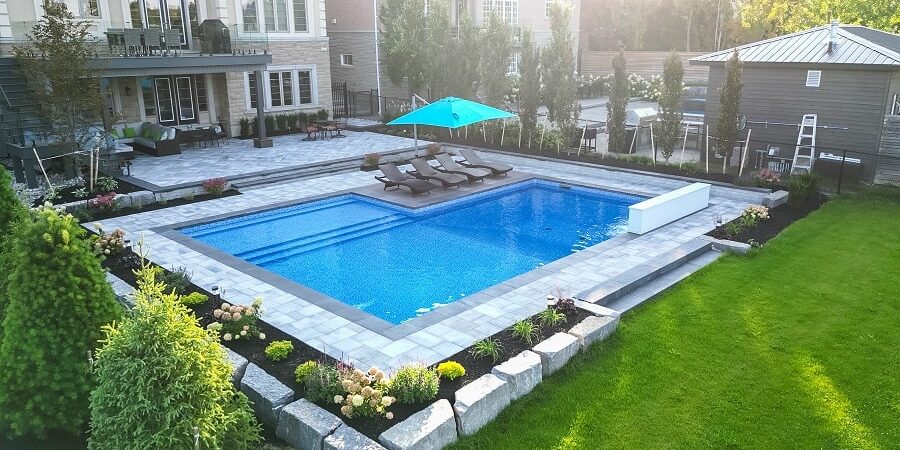How A Custom Pool Layout Can Solve Difficult Backyard Terrain Issues